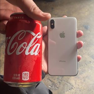 iPhone X with a coke